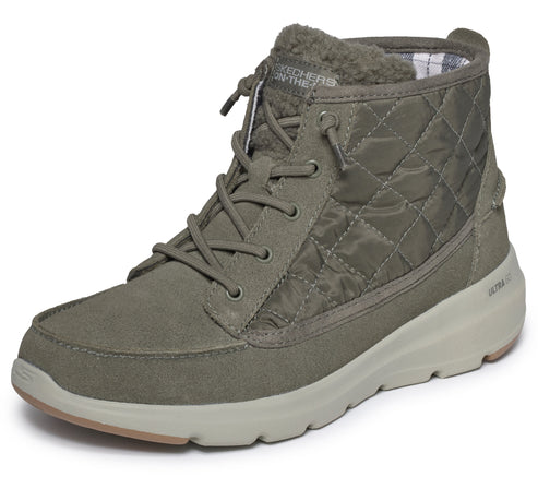 An olive green ankle boot with a quilted side panel, lace-up front, faux fur collar, and a thick, light-colored rubber sole.