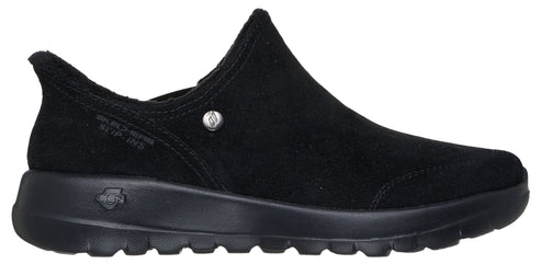 Black slip-on shoe with a rounded toe and a low heel.