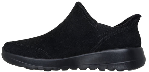 A black slip-on shoe with a raised instep.