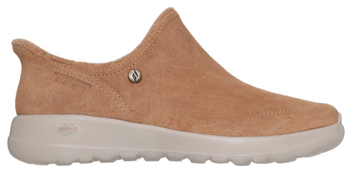 Tan slip-on shoe with a low, cushioned heel.