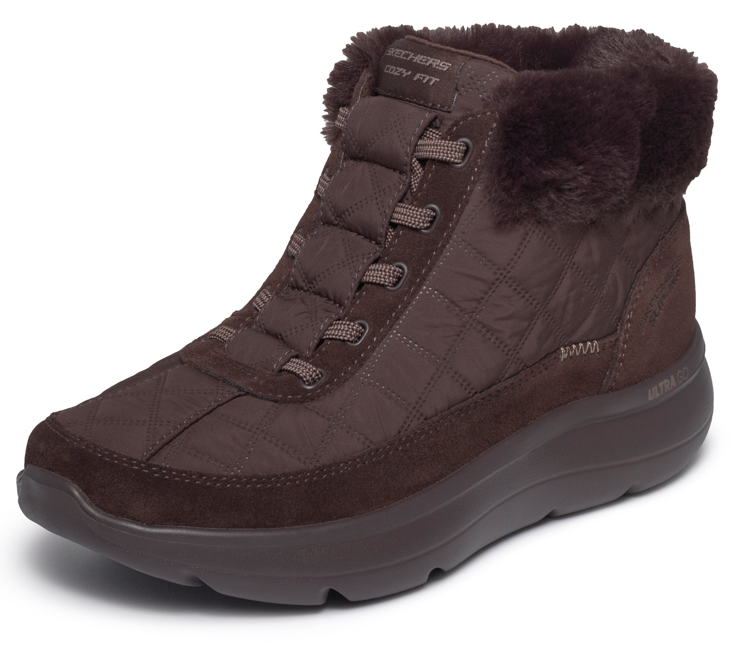 A brown, ankle-high, quilted winter boot with a faux-fur collar, bungee laces, and a thick, dark brown rubber sole, featuring visible 'SKECHERS' and 'COZY FIT' branding on the tongue.