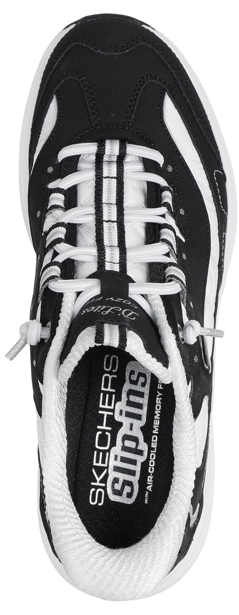 A top-down view of a black and white sneaker with slip-on design, featuring white bungee-style laces, a padded white collar, and interior text reading Skechers Slip-ins with Air-Cooled Memory Foam.