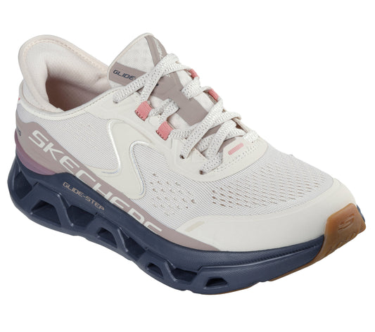 Off-white athletic shoe with gray accents and pink lace guides. "GLIDE-STEP" text on the side and a dark blue sole.