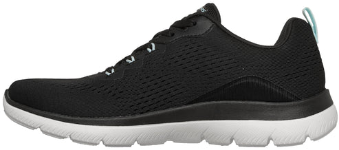 A black athletic sneaker with a white midsole and outsole, featuring a knit mesh upper, black laces, and a small light blue pull tab at the heel.