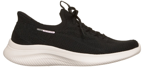 A black sneaker with a white sole.