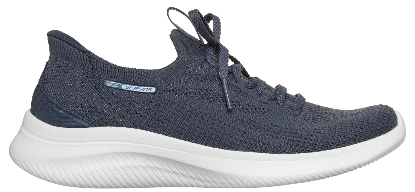 A low top athletic shoe in shades of blue with a white curved sole.
