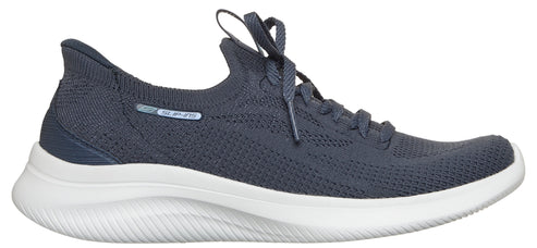 A low top athletic shoe in shades of blue with a white curved sole.