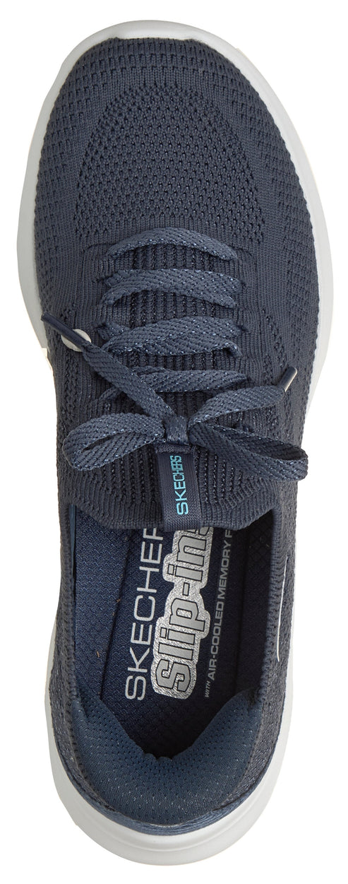 A navy blue shoe with white sole and shoelaces.