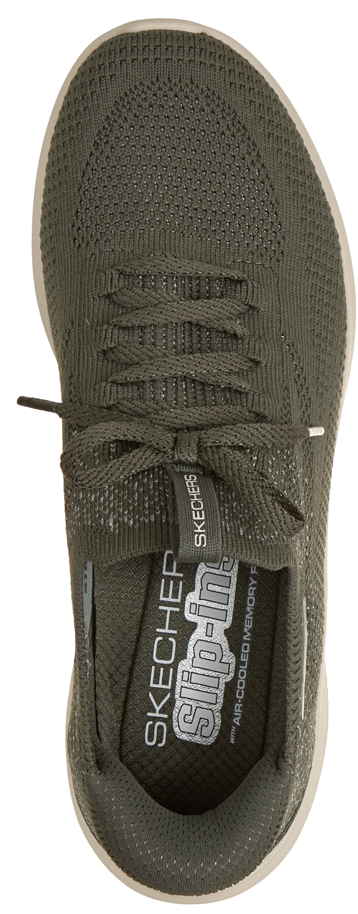 A top-down view of an olive-green slip-on sneaker featuring knitted fabric construction, tonal laces, and an internal cushioned insole with the text 'SKECHERS slip-ins' and 'AIR-COOLED MEMORY FOAM' printed on it.