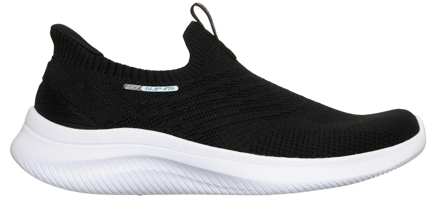 A black sock-style sneaker with a thick white sole.