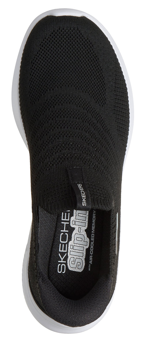 A black shoe with a white sole and slip-in air cooled memory.