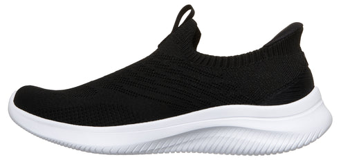 A black slip-on sneaker with a white sole.