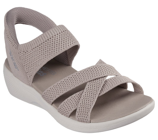 Tan knit sandal with a wide ankle strap and crisscrossing straps on the toe.