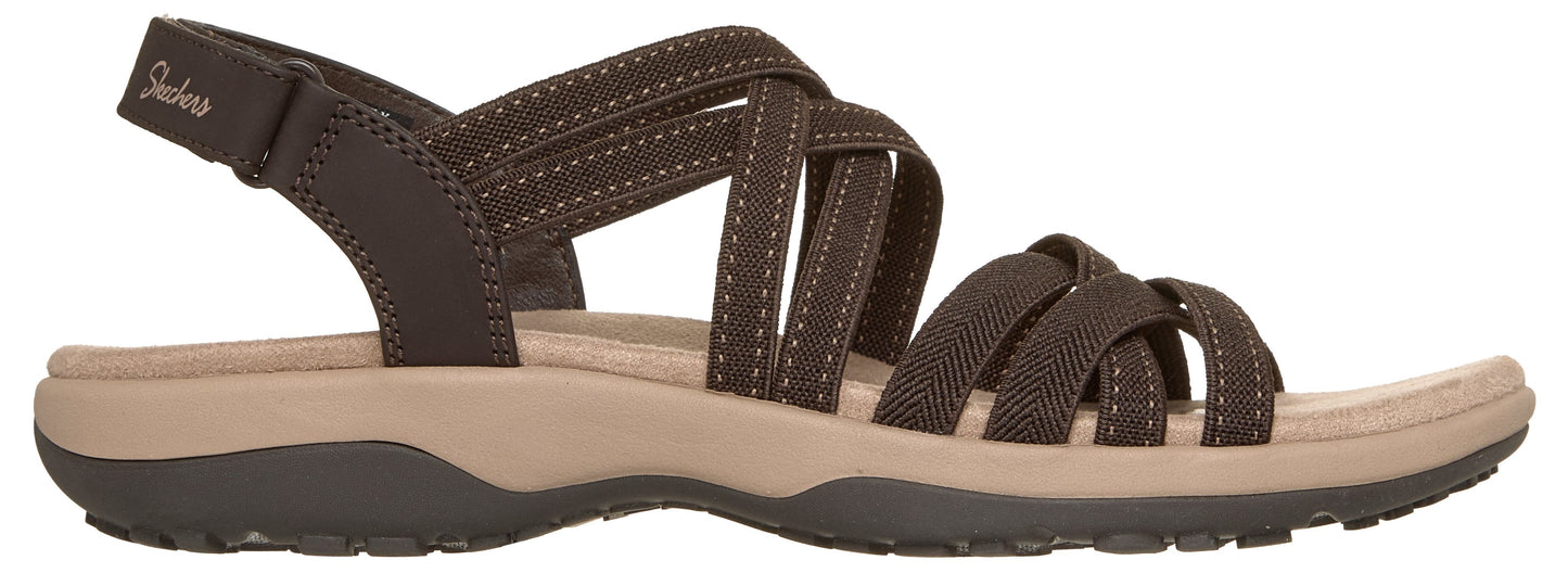 Brown sandal with multiple crisscrossing straps and adjustable ankle strap.