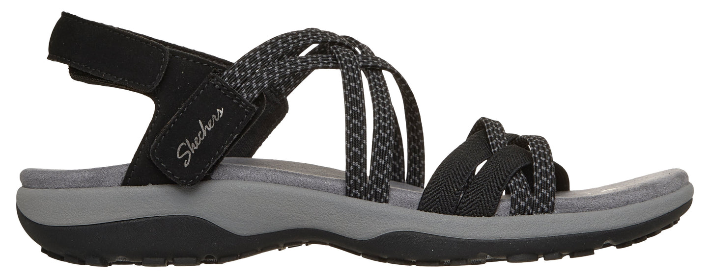 Black sandals with multiple straps and adjustable heel.