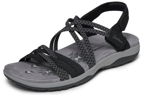 Black multi-strap sandal with elastic heel strap and gray sole.