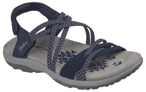 Navy sandal with multiple straps, velcro ankle strap and memory foam footbed.