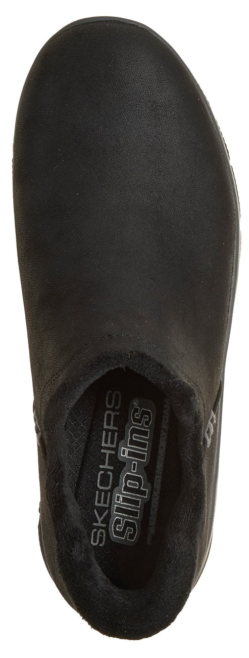 A top-down view of a black slip-on shoe with a padded collar and the text 'SKECHERS Slip-ins' printed on the insole.