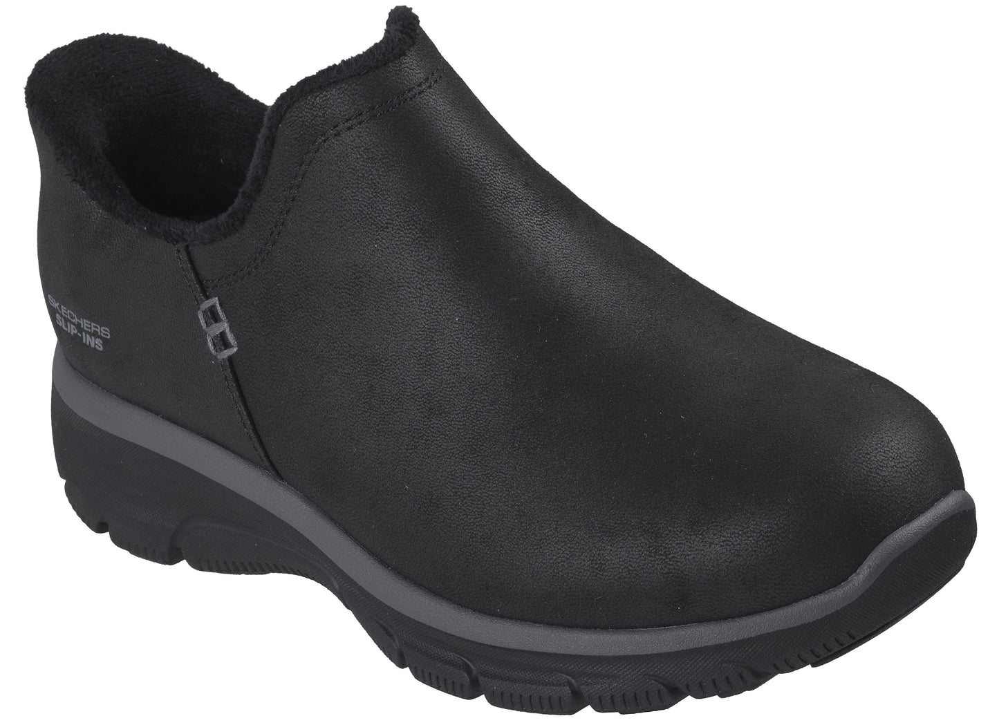 A black, slip-on sneaker featuring a solid, smooth upper, a warm, fuzzy-lined collar, and a thick, dark gray and black textured sole, with the words 'Skechers Slip-ins' visible on the side.