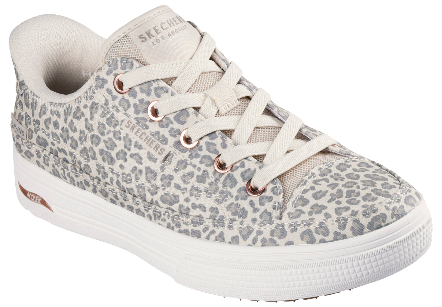 Leopard print sneaker with white laces, rubber soles, and visible "SKECHERS LOS ANGELES" text.