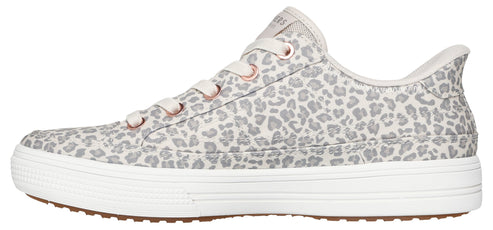 A shoe with a gray and white animal print and white laces.