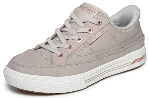 A grey leather sneaker with white sole and laces, and 'SKECHERS LOS ANGELES' printed on the side.