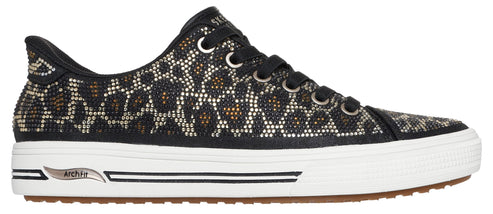 A close-up of a black animal print sneaker with black laces and a white sole.