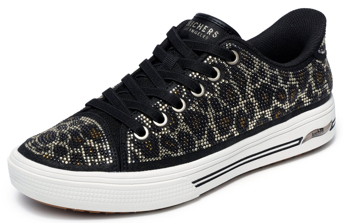 Black and silver low top sneaker with an animal print design and white sole. The shoe laces are black and the collar is a black fabric. The tongue reads Los Angeles.