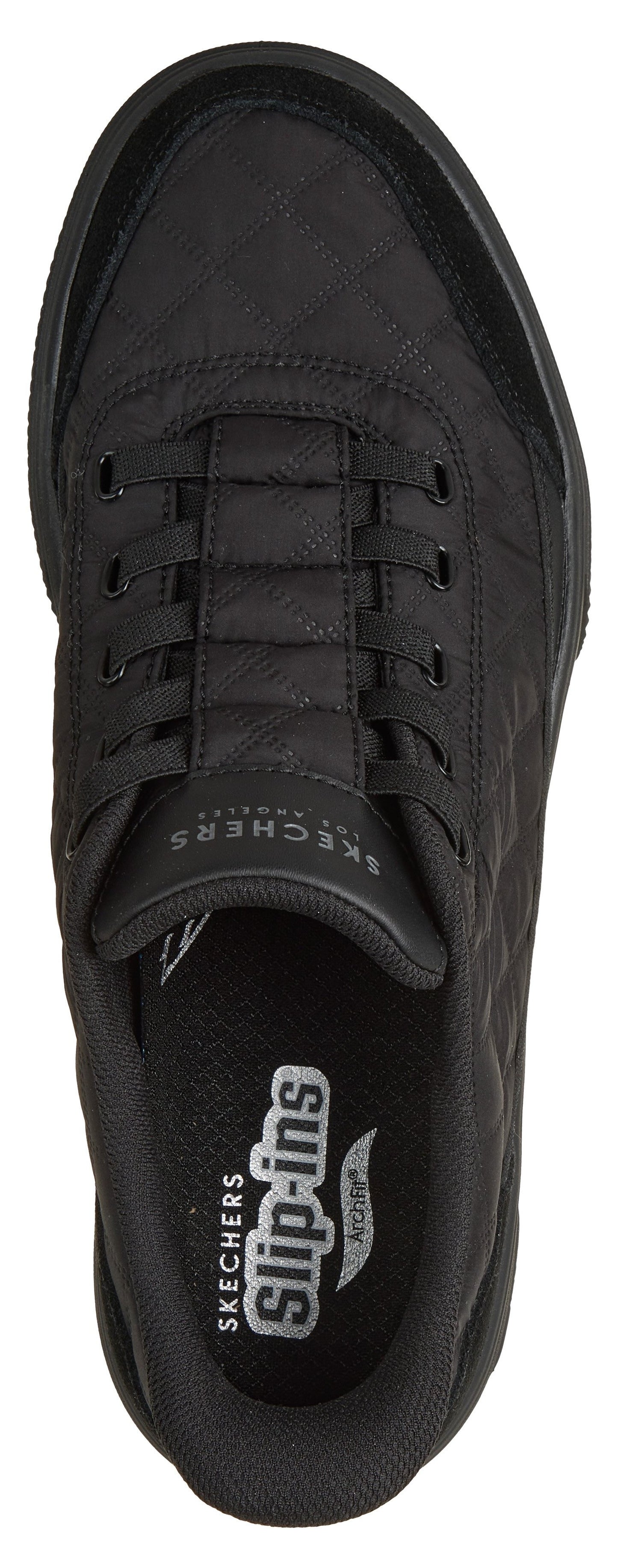 A top-down view of a black slip-on athletic shoe with a quilted upper texture, featuring the text "SKECHERS" on the tongue and "SKECHERS slip-ins" with an "ARCH FIT" logo printed on the insole.