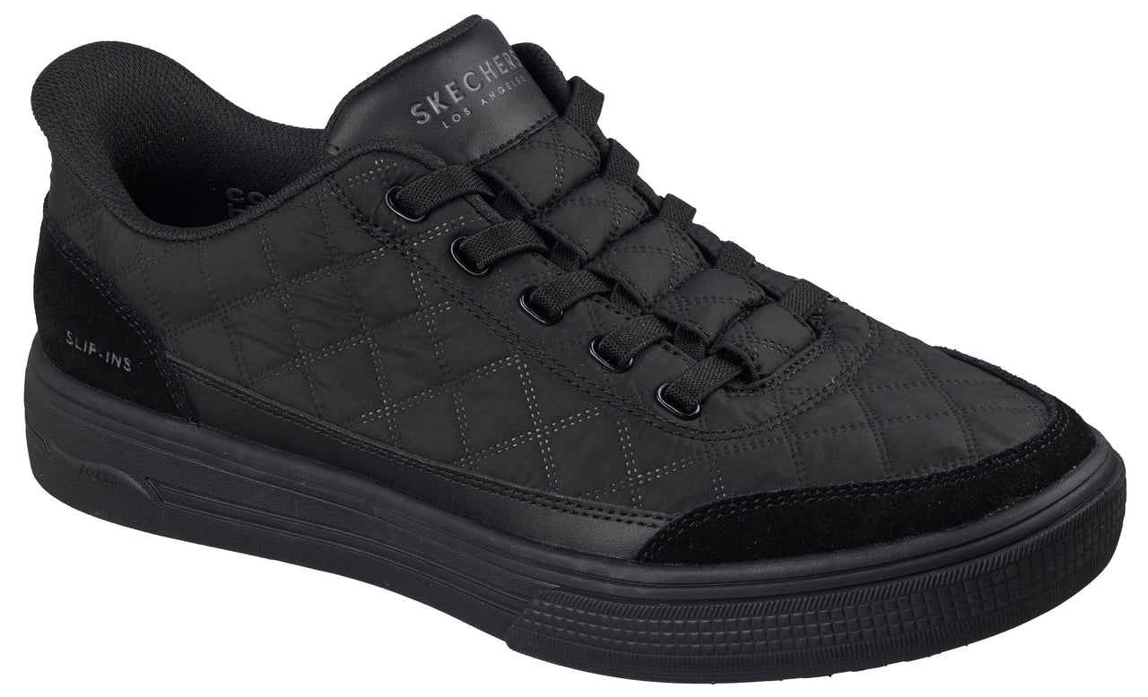 A black Skechers Los Angeles Slip-ins sneaker featuring a quilted pattern on the upper, suede-like overlays on the toe and heel, and elastic laces.