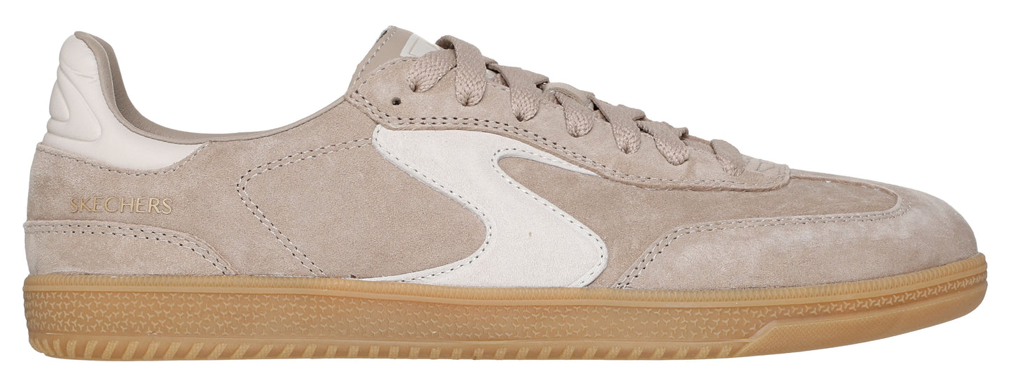 A beige suede sneaker with a gum sole and white accents.