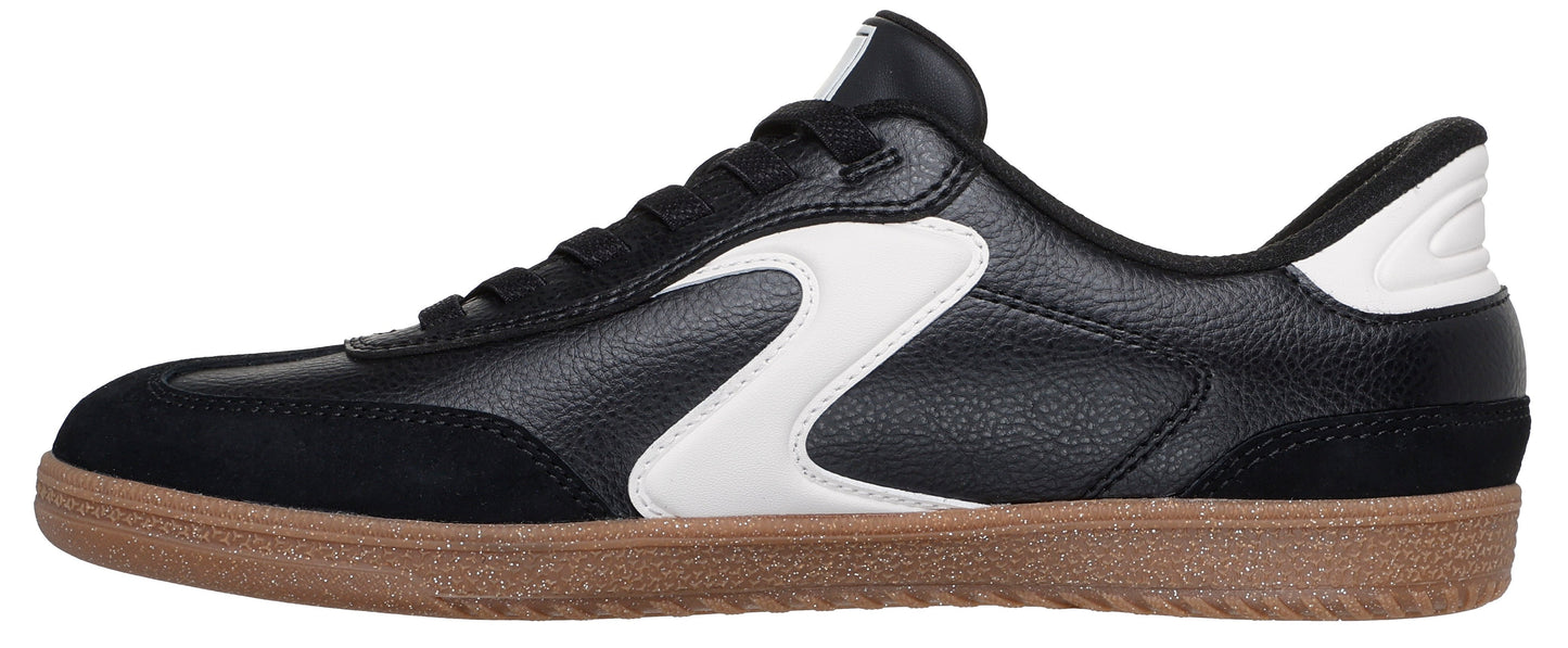 Black and white athletic shoe with brown sole.