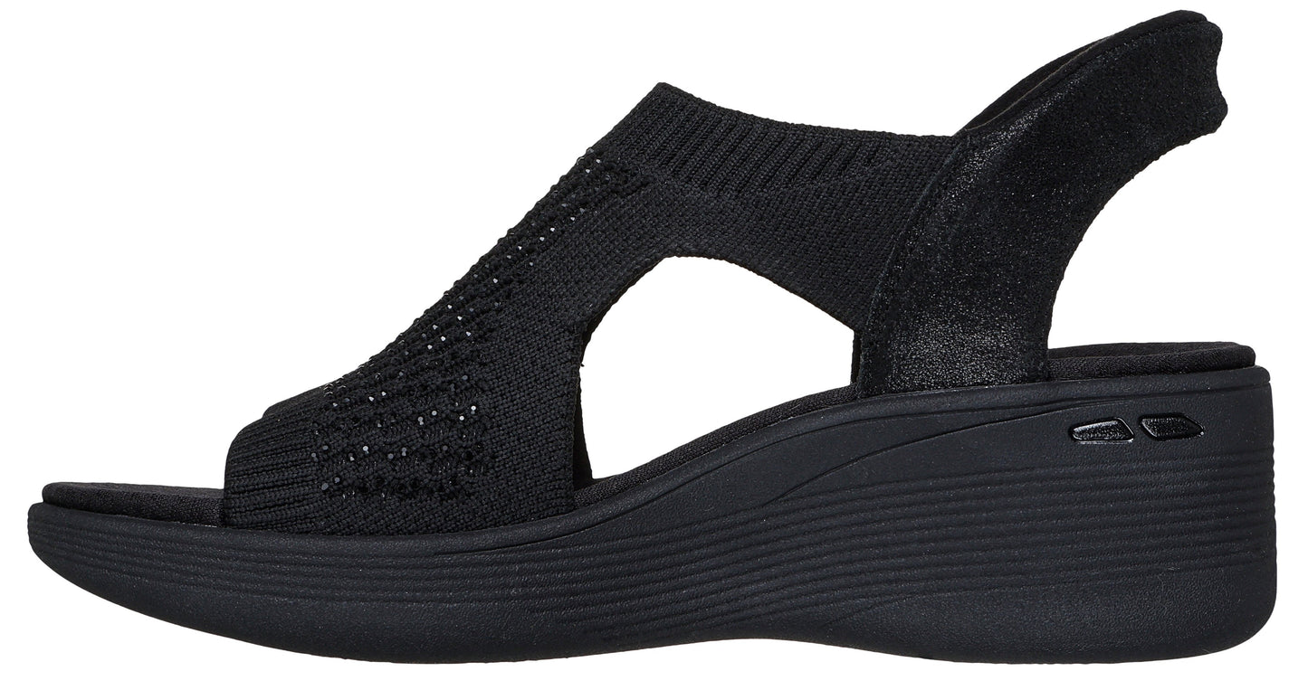 Black sandal with a textured knit front and a slingback heel.