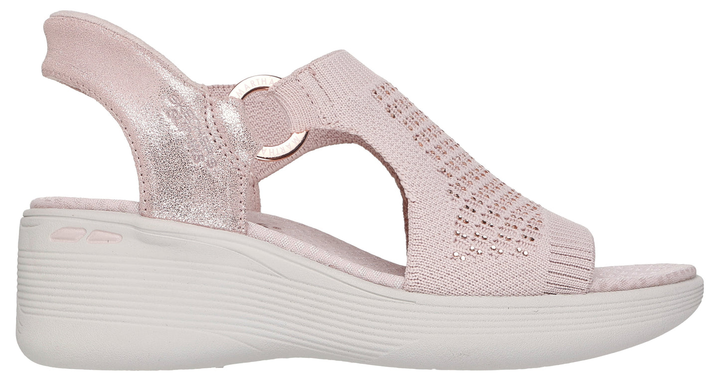 Pink knit sandal with adjustable ring and off-white platform sole.
