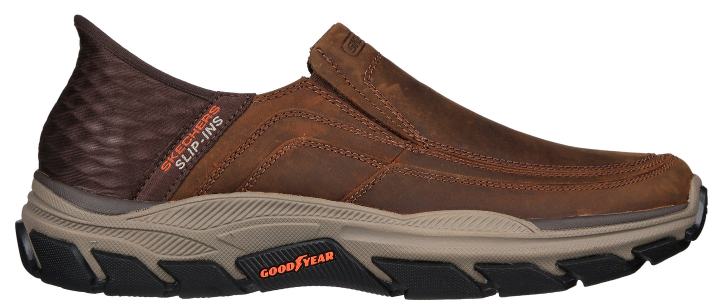 Brown slip-on shoe with 'GOODYEAR' written on the side.