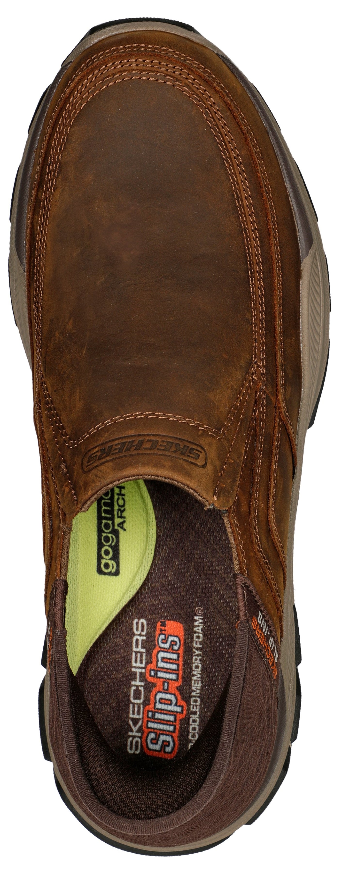 A brown leather slip-on shoe with visible "SKECHERS Slip-ins" text on the insole.