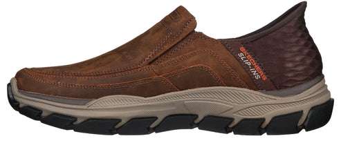 A brown slip-on shoe with orange "SLIP-INS" text on the back.