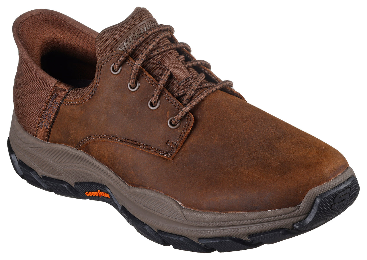 Brown leather casual shoe with laced closure.