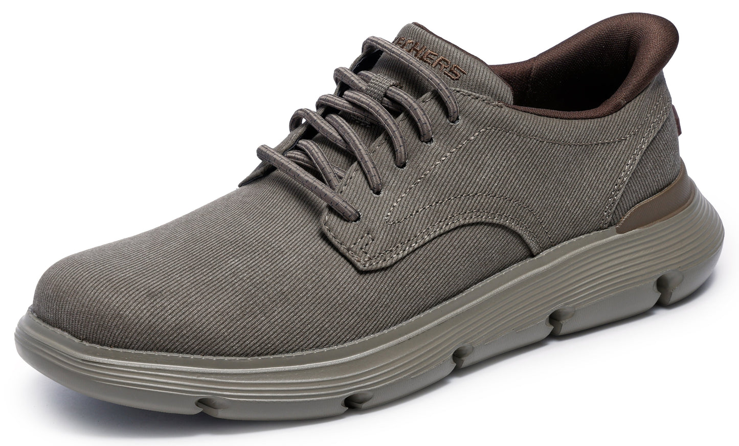 Grey casual sneaker with matching sole and laces; brown inner lining and accent.