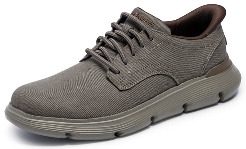 Grey casual sneaker with matching sole and laces; brown inner lining and accent.