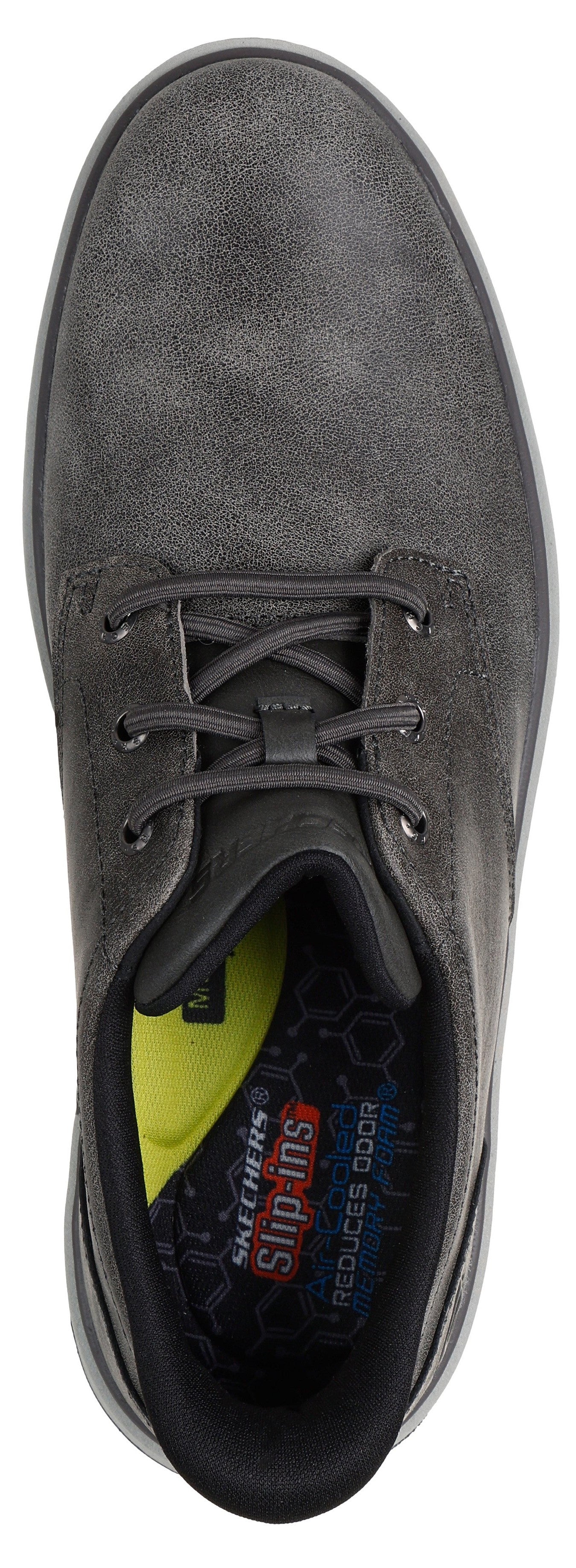 A top-down view of a dark grey Skechers Slip-ins shoe with lace-up styling, a black interior collar, and a yellow cushioned insole showing the text 'Skechers Slip-ins' and 'Reduces odor'.