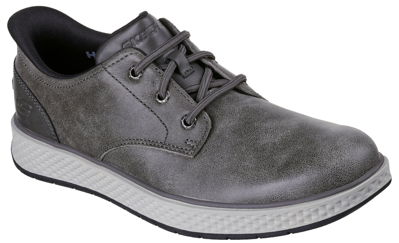 A gray low-top casual sneaker with a leather-like upper, matching gray laces, and a textured, light gray midsole with a black outsole.
