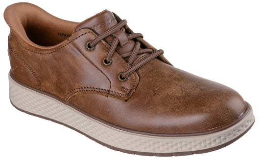 A brown leather low-top casual shoe with a tan-colored, textured rubber sole and matching brown laces.