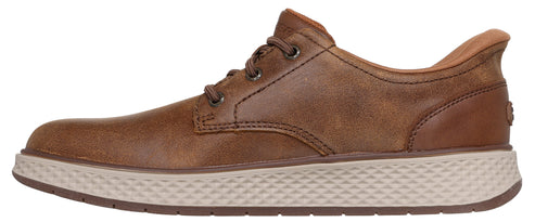 A brown leather lace-up shoe with a textured light beige rubber outsole.