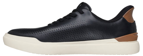 A black shoe with a perforated pattern, tan heel detail, and white sole.