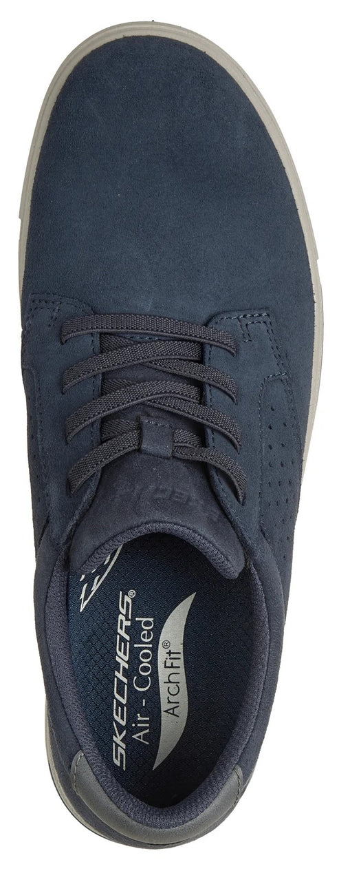 A top-down view of a dark blue, lace-up sneaker with a light-colored sole, showing the interior insole with the text 'SKECHERS Air-Cooled ArchFit' printed on it.