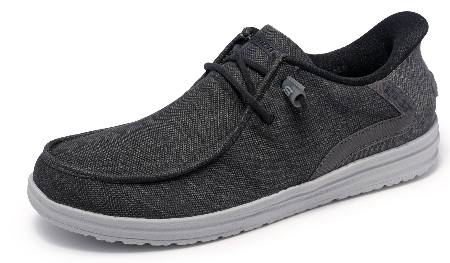 Charcoal-colored canvas shoe with black laces and gray sole.