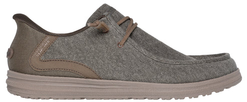 A brown canvas slip-on shoe with laces.