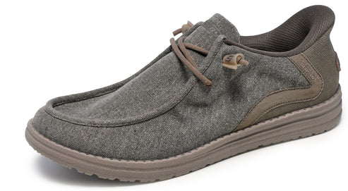 Low profile dark gray canvas shoe with laces and brown sole.