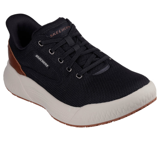 Black sneaker with laces and white curved sole featuring the word 'SKECHERS'.